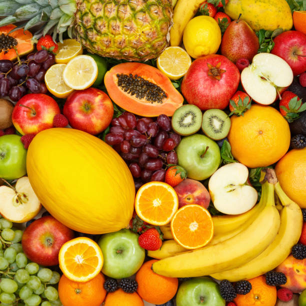istock Fruits collection food background square apples oranges lemons fresh fruit 1173970257