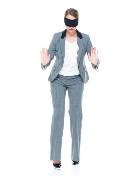 istock Businesswoman wearing blindfold 1173976358