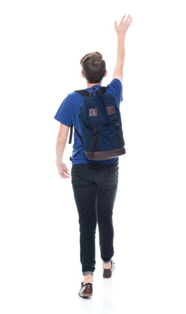 istock Young high school age male student is waving 1173977580