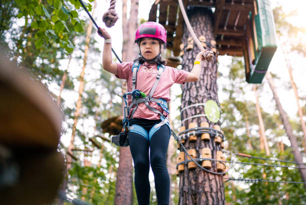istock Girl having fun in adventure park 1173978192