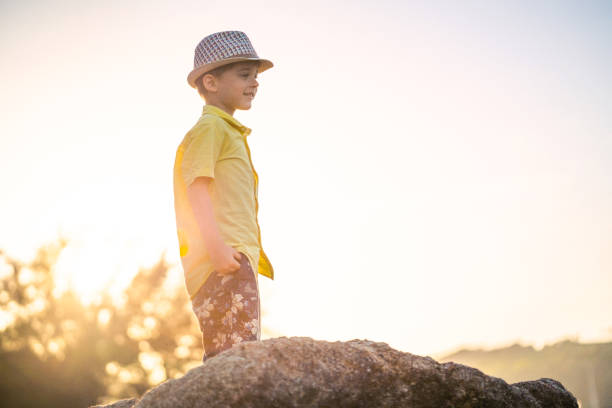 istock Cute boy relaxing outdoors 1173978235