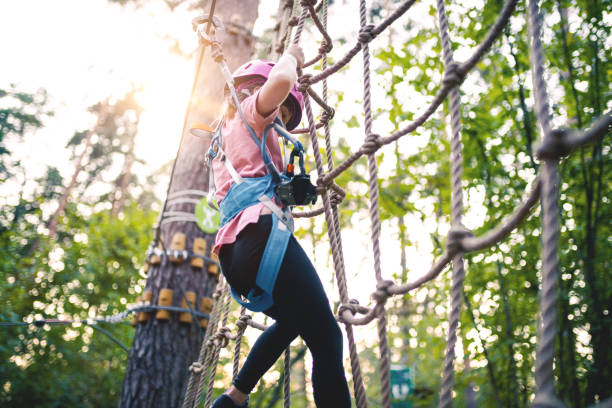 istock Girl having fun in adventure park 1173978504