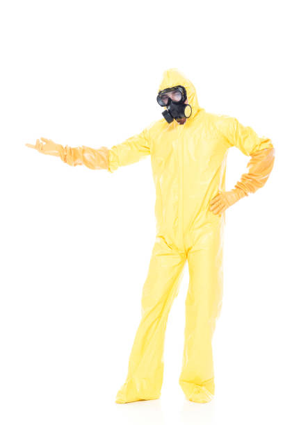 istock Man in protective clothing presenting / showing to the side 1173978617