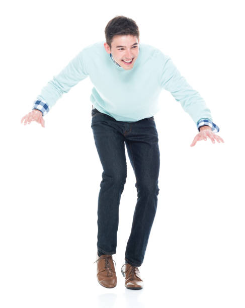 istock Handsome young man walking carefully / tip toe 1173979804