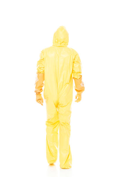 istock Man in protective clothing walking 1173979967
