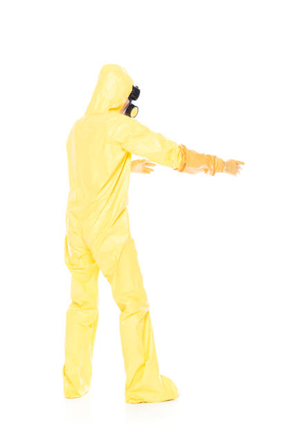 istock Man in protective clothing lifting / holding invisible object 1173980162
