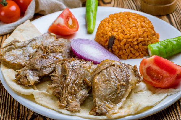 istock baked lamb with bulgur Turkish cuisine on wooden table 1173982618