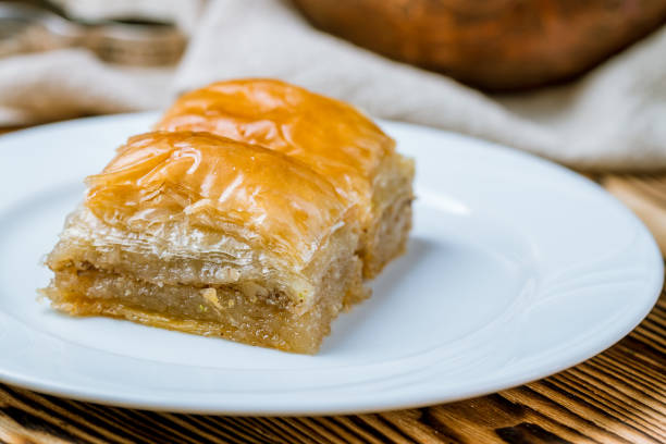 istock baklava with walnuts on wooden table. Turkish cuisine 1173982655