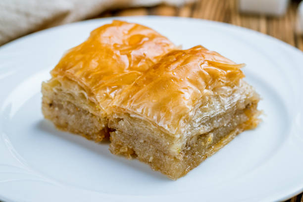 istock baklava with walnuts on wooden table. Turkish cuisine 1173982700