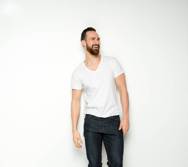 istock Handsome man standing with white shirt on white background 1173983127