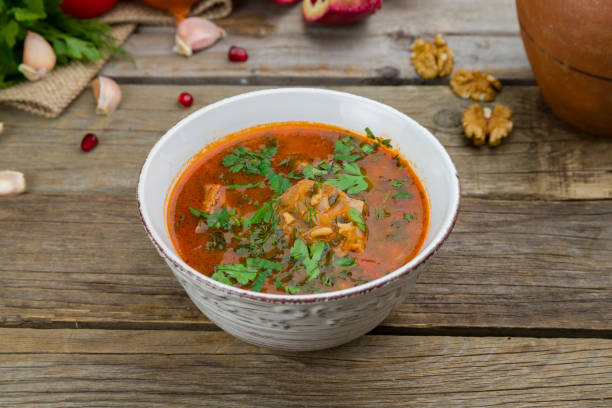 istock soup kharcho on bowl on old wooden table 1173984824