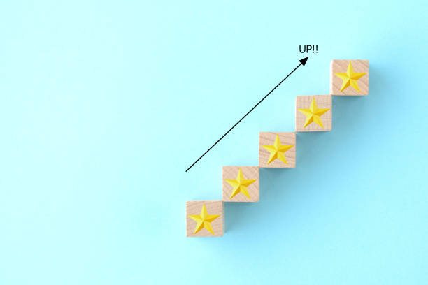 istock 5 stars assessment on light blue background 1173998883