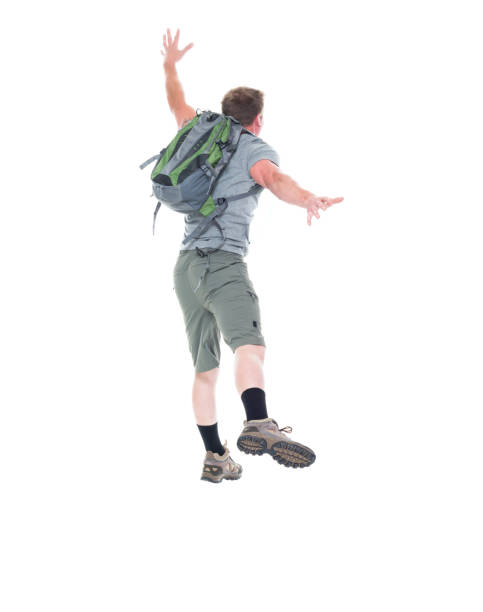 istock Friendly male hiker is jumping with excitement, rear view 1174008826