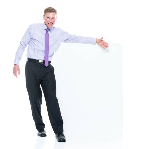 istock Young attractive businessman on white background - showing 1174012798