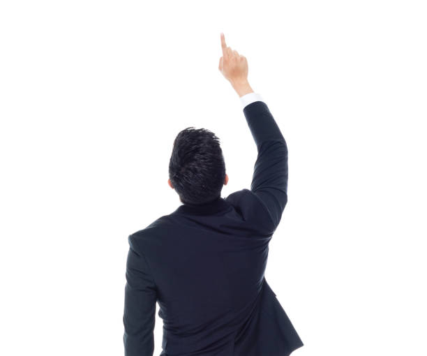 istock Attractive looking Chinese businessman - pointing up 1174016196