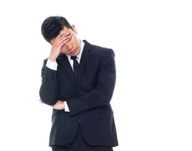 istock Handsome Asian / Chinese  businessman - sadness 1174016383