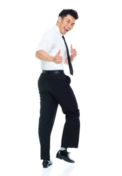 istock Handsome Asian Businessman - rear view walking and doing thumbs up 1174016588