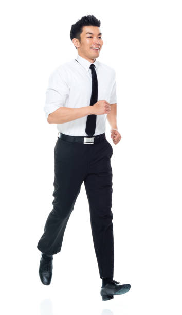 istock Handsome Asian Businessman - running 1174016756