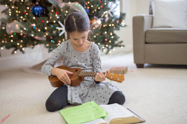 160+ Ukulele Santa Stock Photos, Pictures & Royalty-Free Images