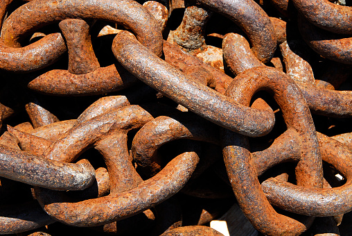 Very rusty very used chains used by the big ships