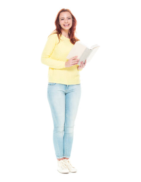 istock Cute female holding one book 1174034211