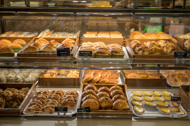 istock Assorted pastry and bread arranged on tray at bakery shop. 1174035213