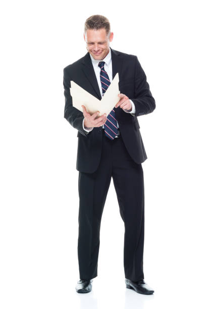 istock Businessman is holding a manila folder 1174035351