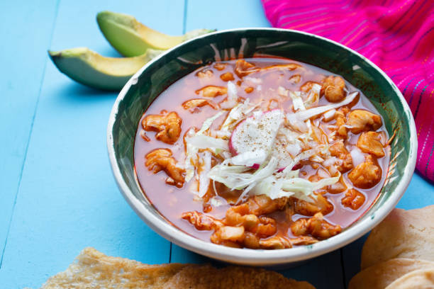 istock Mexican red pozole soup on blue background 1174039734