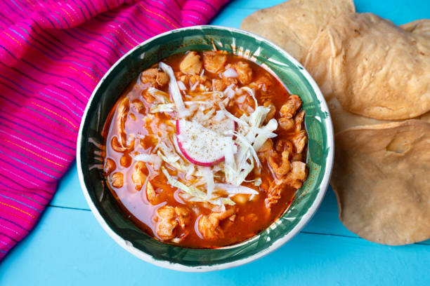istock Mexican red pozole soup on blue background 1174040674