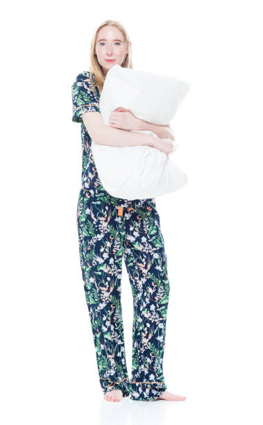 istock Attractive female in pajamas 1174040937