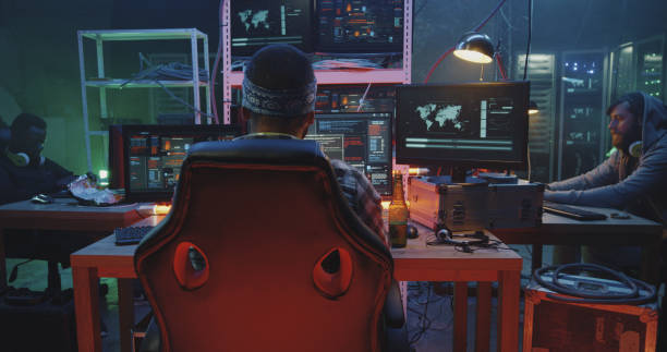 istock Hacker celebrating success with friend 1174041125