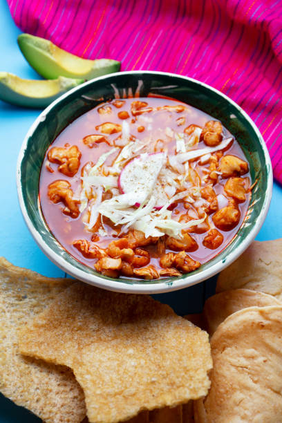istock Mexican red pozole soup on blue background 1174041176