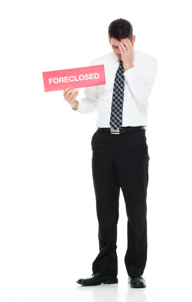 Full length / one man only of 30-39 years old handsome people caucasian male / mid adult men / mid adult business person / businessman standing in front of white background wearing lumberjack shirt / button down shirt / shirt / necktie / pants who is depression - sadness / feeling sad / emotional stress / with anxiety / sulking with hands on head / foreclosed longitud completa / un hombre sólo de 30-39 años de edad gente guapo hombres caucásicos / hombres adultos medios / persona de negocios de adultos medios / hombre de negocios de pie frente a fondo blanco usando camisa de leñador / camisa / camisa / corb