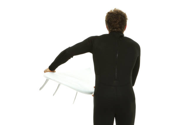 one man only / waist up / rear view of 20-29 years old adult handsome people caucasian male / young men in front of white background wearing wetsuit / swimwear who is excited / happy / smiling / successful / shouting and celebration - thank you excitement waist up horizontal imagens e fotografias de stock