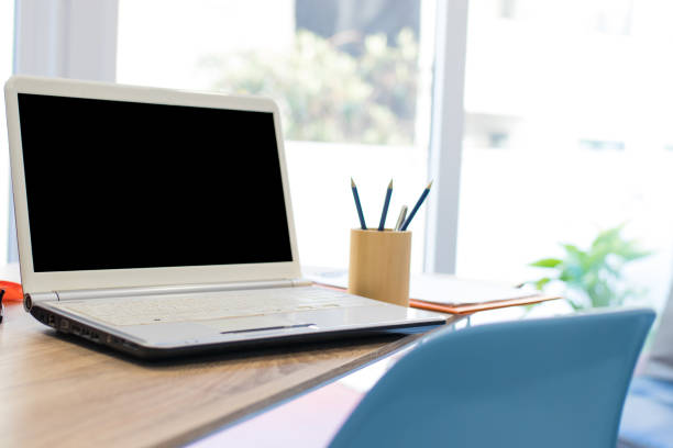 istock desktop with laptop at home or in the office 1174046912