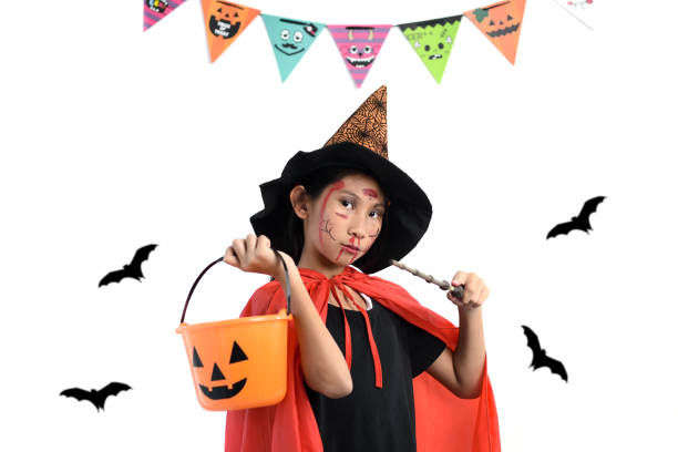 istock Asian girl with witch costume, halloween concept. 1174048108
