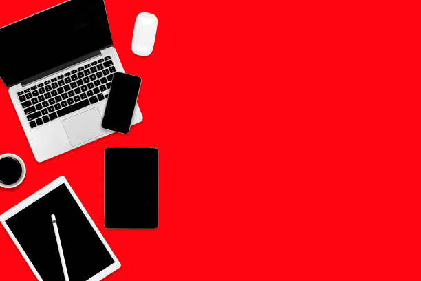 istock Flat lay of office table with laptop computer, digital tablet, mobile phone and accessories. 1174050593