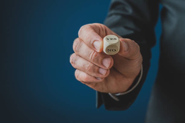 istock Wooden dice with Yes and No words 1174050661