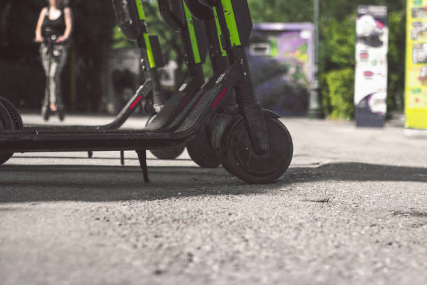 istock Electic scooters parked on the street, with copy space 1174056456