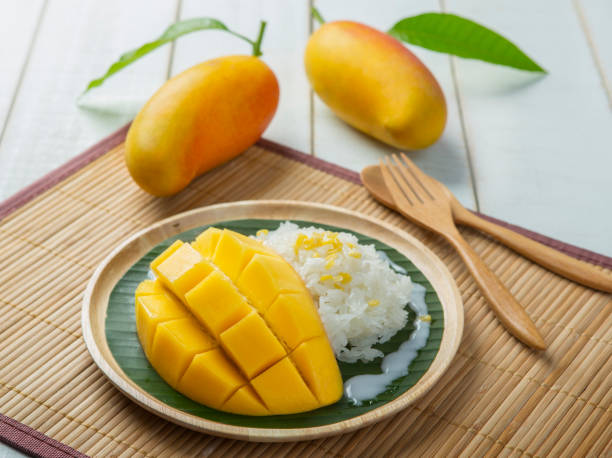istock Dessert sweet sticky rice with mango coconut milk 1174057885
