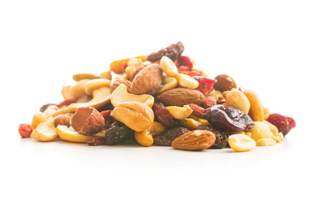 istock Mix of various nuts and raisins. 1174061376