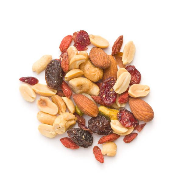 istock Mix of various nuts and raisins. 1174061377
