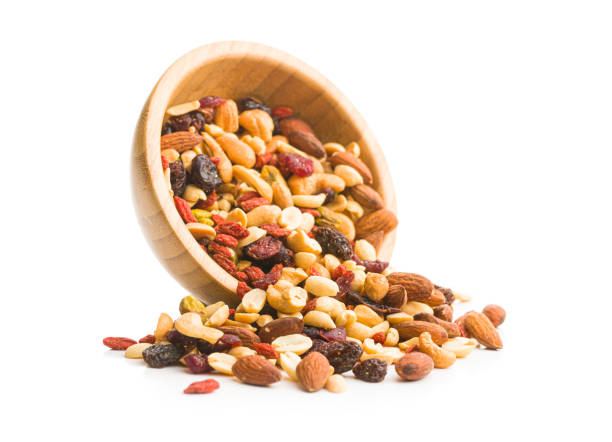 istock Mix of various nuts and raisins 1174061474