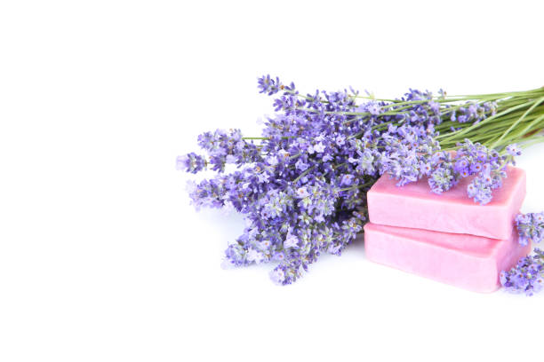 istock Lavender flowers with soap on white background 1174061651