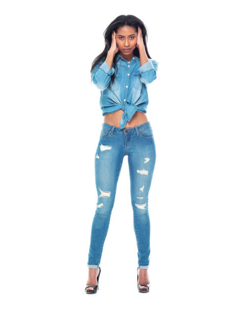 istock Beautiful latino female wearing double denim 1174062939