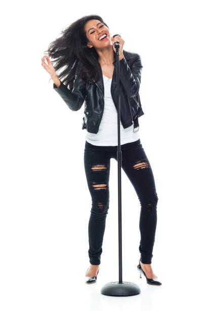 istock Bautiful woman wearing a leather jacket and singing like a rock star 1174063324