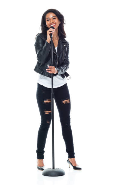 istock Bautiful woman wearing a leather jacket and singing like a rock star 1174063336