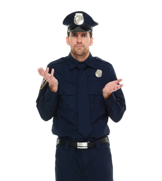 One man only / waist up / front view / looking at camera of 30-39 years old adult handsome people brown hair / with beard / short hair caucasian male / young men police force / security staff standing in front of white background - fotografia de stock