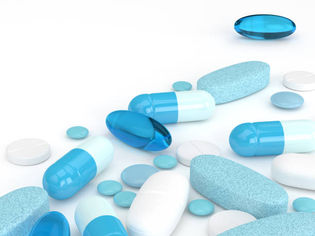 istock 3d render of pills, tablets and capsules over white 1174065881