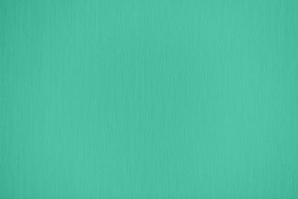 mint colored low contrast paper textured background